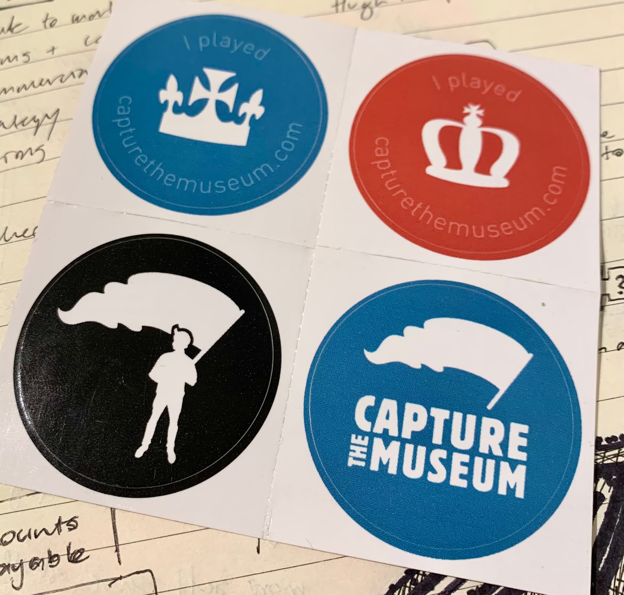 A set of four stickers with the Capture the Museum logo and gameplay elements.