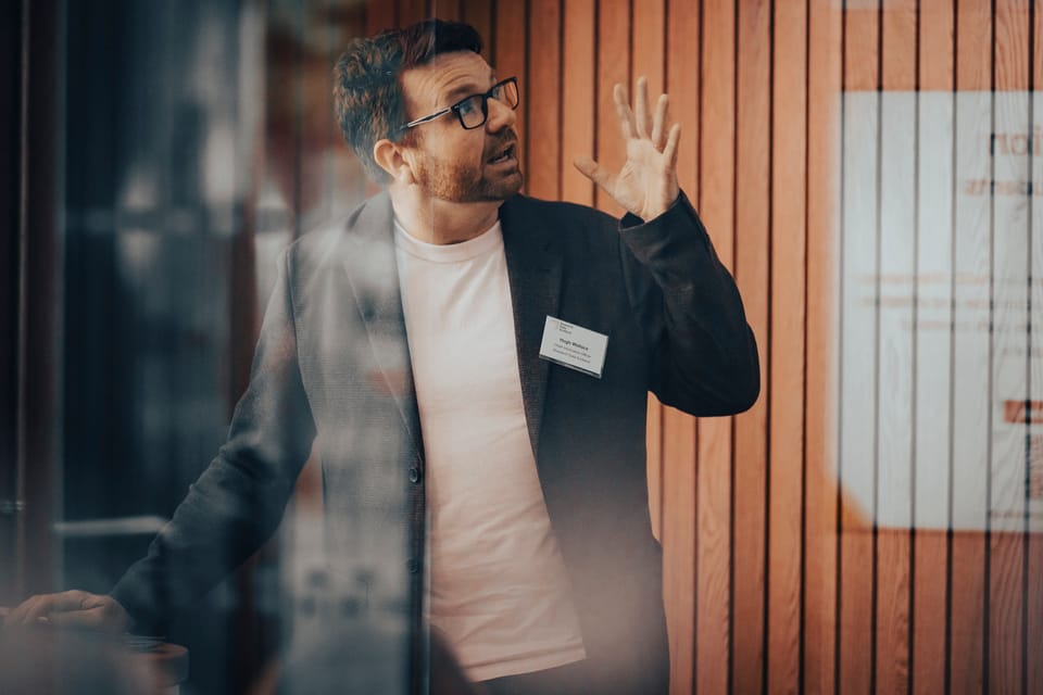 Photo of Hugh Wallace presenting